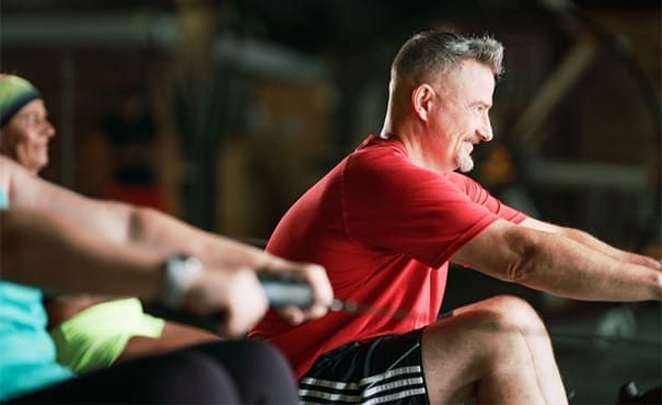 man working out on rower at CrossFit Fortis